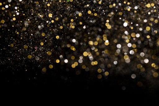 A closeup shot of beautiful gold and silver glitter for wallpaper and background