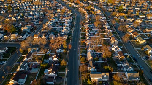 An aerial view of Long Island - a suburban neighborhood during a beautiful sunrise