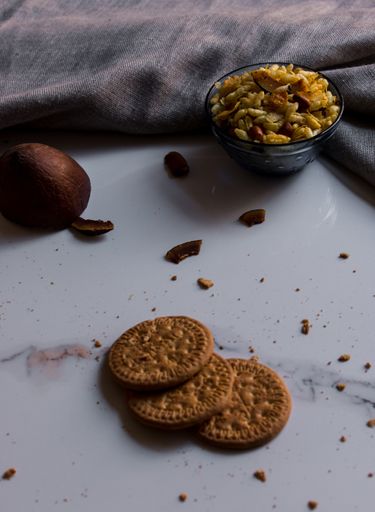A selective focus shot of delicious Indian snack with round cookies