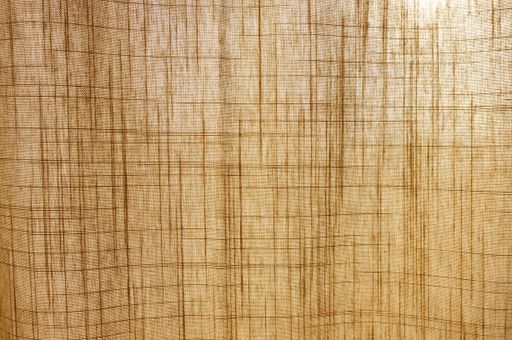 A closeup shot of brown curtain texture