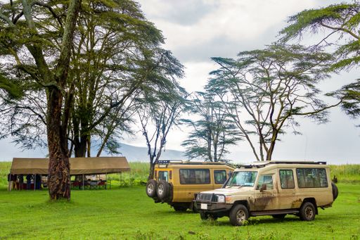 A closeup shot of touring cars in Ngorongoro Crater in Tanzania
