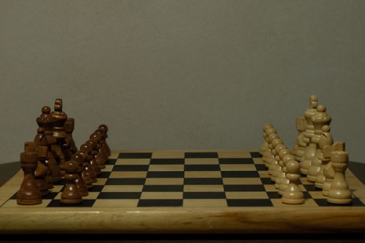 A closeup shot of chess pieces on a chessboard