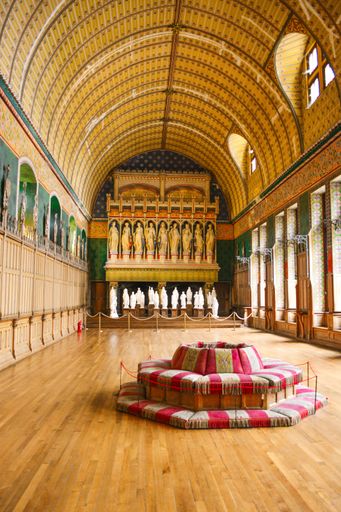 An arch meeting room with wooden floor inside Chateau de Pierrefonds Castle in Pierrefonds, Oise, France