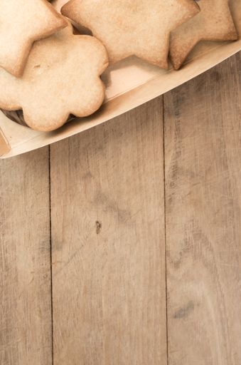 A vertical shot of cookies on a wooden surface - perfect for your content