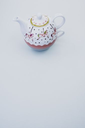 A vertical shot of teapot isolated on white background