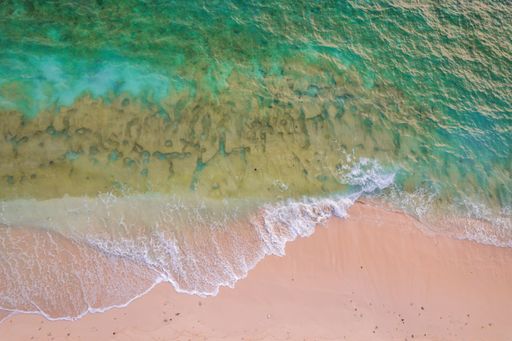 The high angle of Maldives island beach, a tropical landscape of Kamadhoo