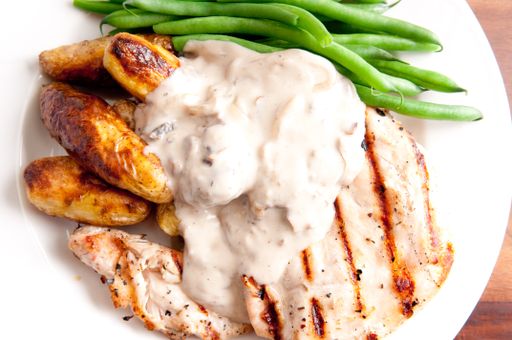 bbq chicken breast with creamy mushroom sauce and fingerling potatoes