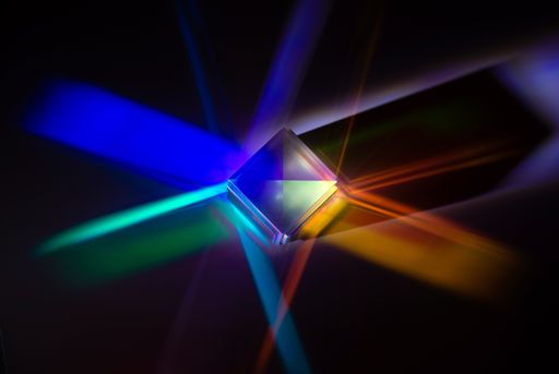 the light spectrum reflected from a crystal cube in many colours