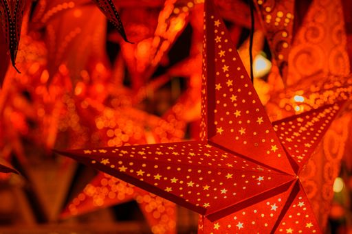 christmas star mad of paper on a christmas market