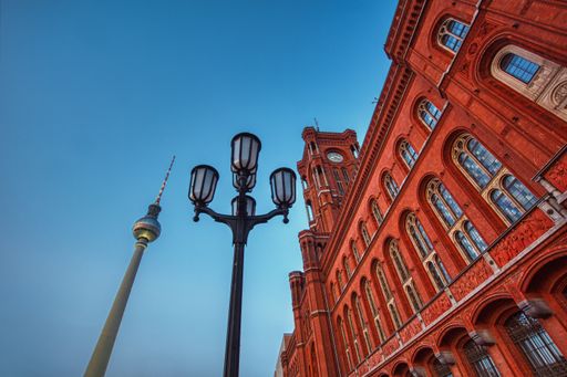 A low angle shot of the Red Townhall and Stuttgart TV Tower in Berlin, Germany