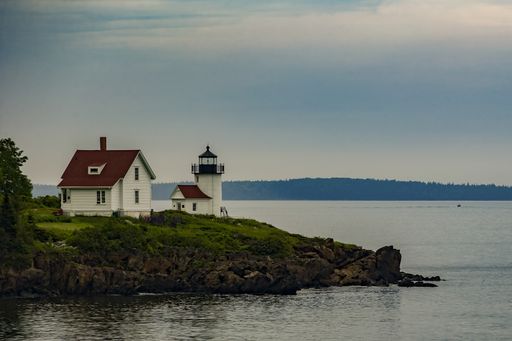 A small lighthouse in the harbor of Camden, Maine