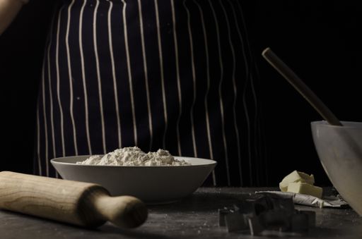 A closeup shot of baking ingredients for Christmas cookies on the table