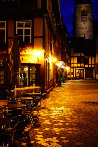 timbered houses in old town during blue hour