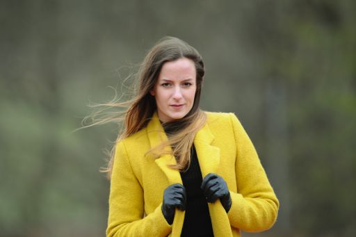 Young lady with yellow jacket, fashion portrait shots on the street