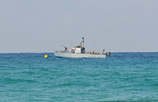 two Israeli patrol boats off the coast with Lebanese border sailing on blue seas