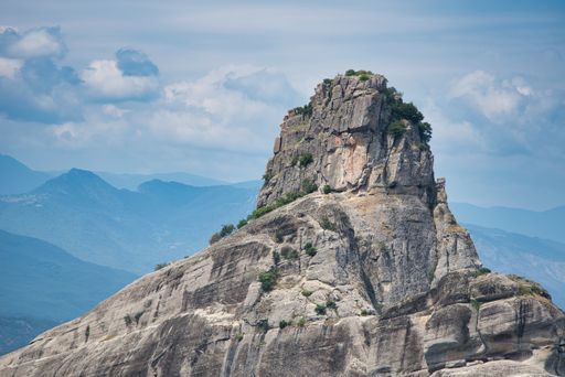 A beautiful shot of the Meteora rock formations on a sunny day in Greece