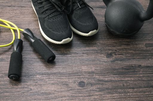 A high angle shot of sports equipment on a wooden surface