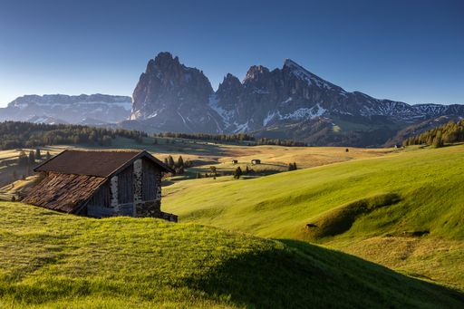 The beautiful Langkofel group gleaming under the blue sky in Italy