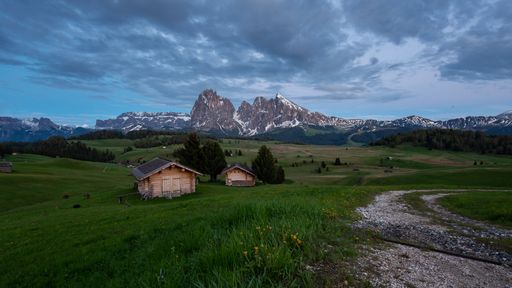 The beautiful Langkofel group gleaming under the cloudy sky in Italy