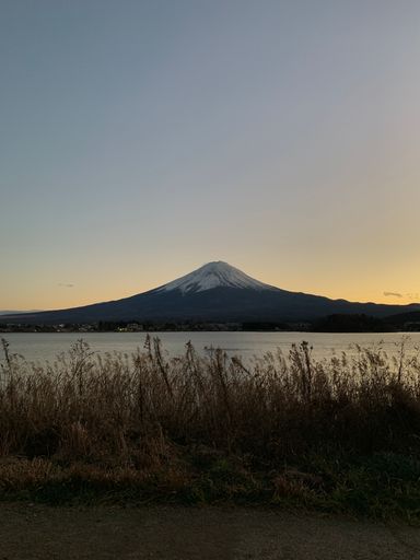 Mount Fuji in evening among the tranquil lake.