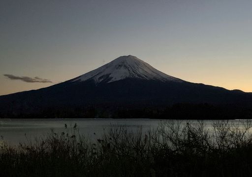 Mount Fuji in evening among the tranquil lake.