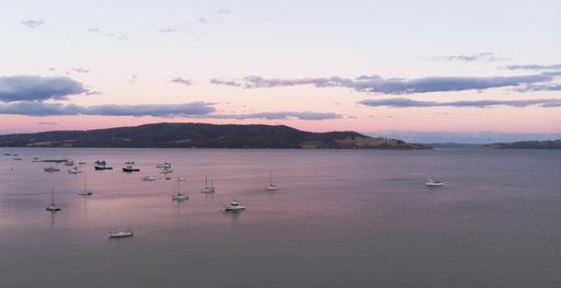 An aerial shot of ships in the harbor