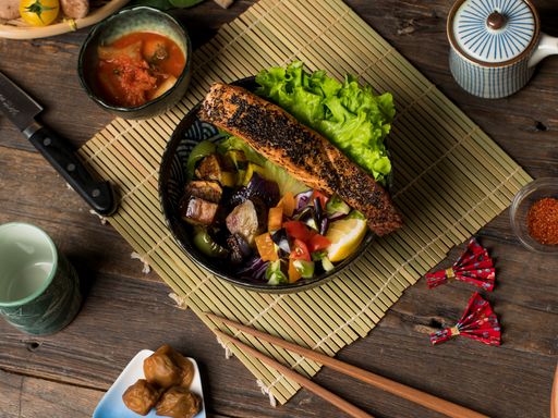 A top view of Japanese rice bowl with mushrooms and tofu