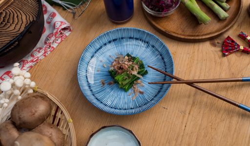 Japanese cuisine with chopsticks on a wooden table