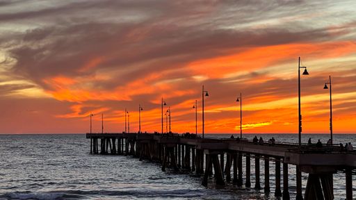 Multi color winter burn sunset over Venice pier and beach in Los Angeles