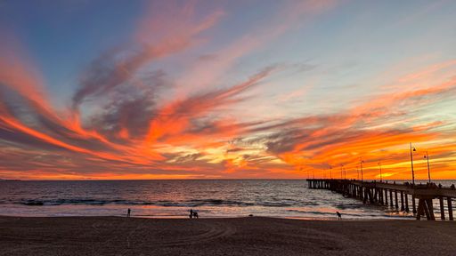 Multi color winter burn sunset over Venice pier and beach in Los Angeles