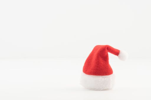 A Santa's hat isolated in the white background with a copy space