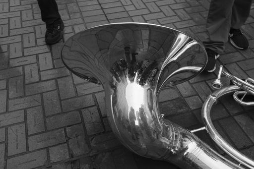 A high angle greyscale shot of a tube laying on the ground in Portland
