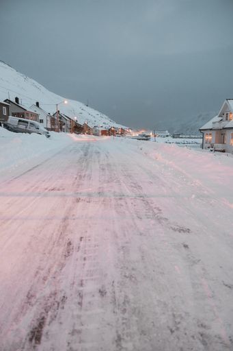 A marvelous magical scenery of a neighborhood full of lights in Skarsvag, Norway