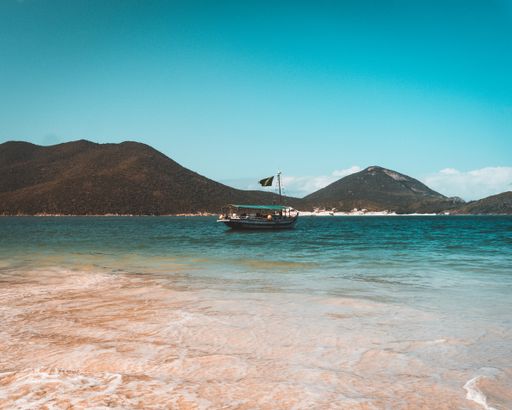 Beautiful shot of a Boat in Rio de Janeiro beach.