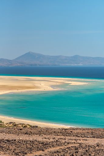 A view at the shoreline of the Playa de Sotavento in Fuerteventura, Spain
