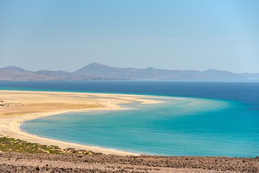 A view at the shoreline of the Playa de Sotavento in Fuerteventura, Spain