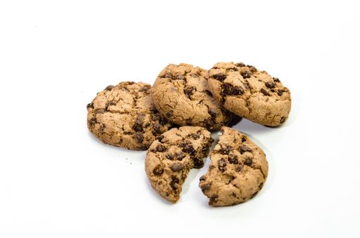 A high angle shot of chocolate chip cookies isolated on white background