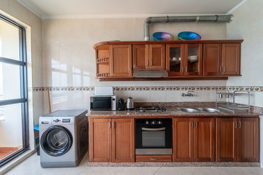 Classic kitchen fully equipped with the necessary appliances,