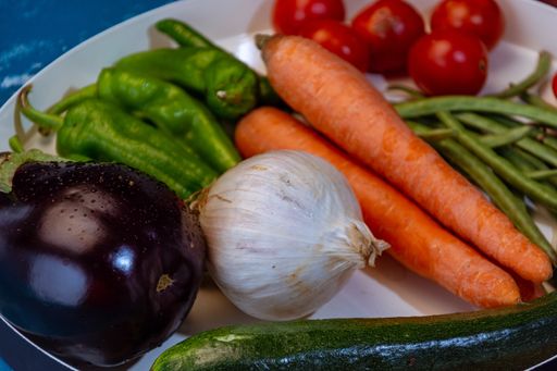 A closeup shot of fresh vegetables on a plate