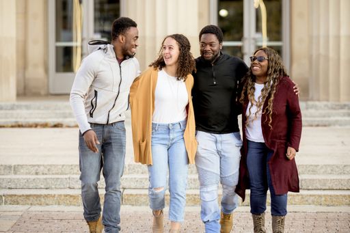 A cute shot of friends joking and laughing together spreading positivity around