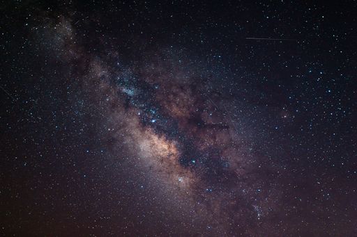 The Milky Way galaxy shining through the starry sky at night