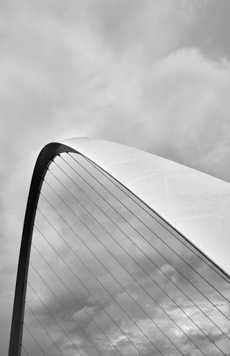 Black and white close up of the millennium bridge in Newcastle of a over cast day