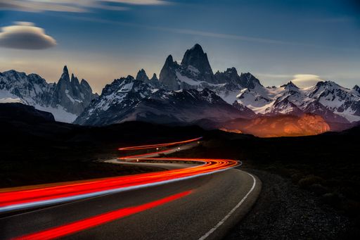 A timelapse shot of car lights in Fitz Roy Mountains in Argentina