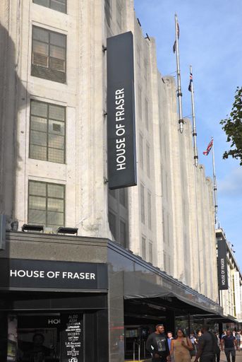 House of Fraser store in Oxford Street, London, United Kingdom. People walk past on the pavement/sidewalk in the sun. House of Fras logo can be seen