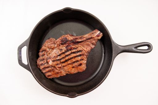 ethically raised, fresh cut organic rib steak grilled rare