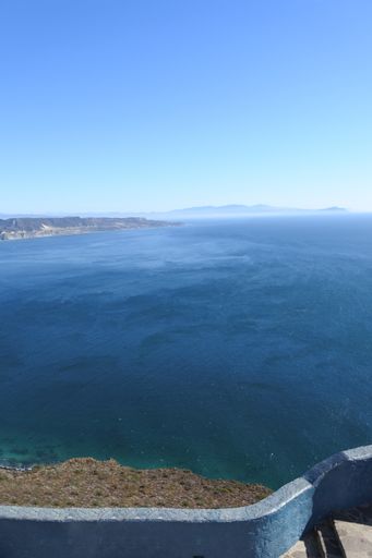 A vertical shot of the view of the ocean from shore in Baja California, Mexico during daylight