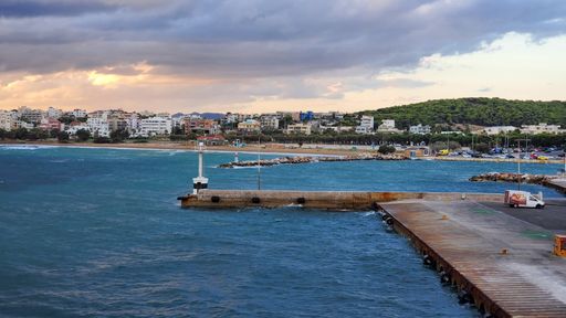 as the sunrises, we are sitting in the Port of Rafina looking out from the ferry