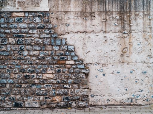 A closeup shot of a wall with beautiful stones and cement