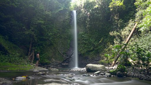 A long exposure shot of a beautiful Bombaim waterfall in Sao Tome and Principe, Africa