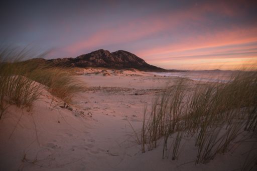 A view of Louro Peak against a beautiful sunset sky in Galicia, Spain